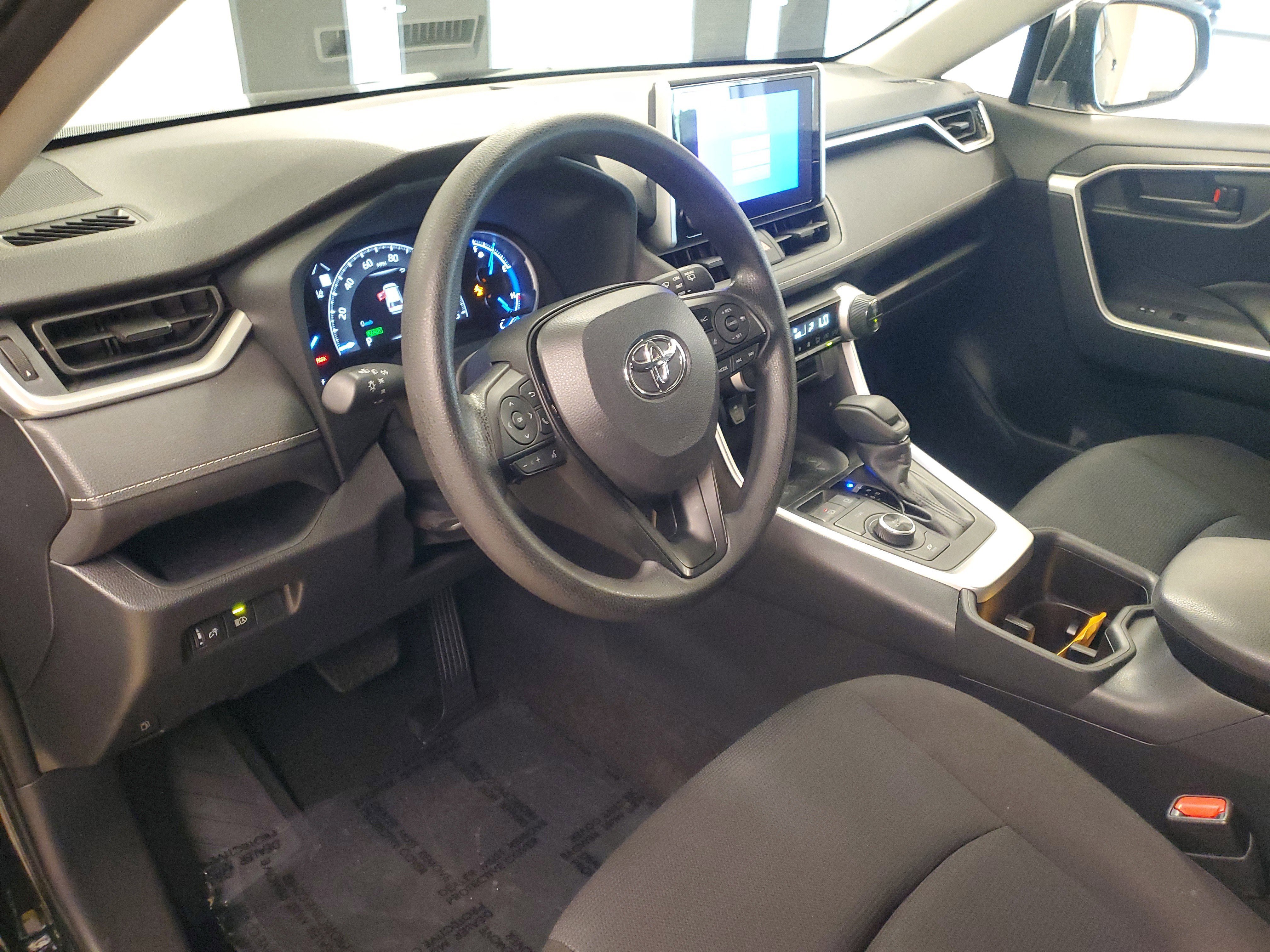 Used 2024 Midnight Black Metallic Toyota Hybrid LE image 15