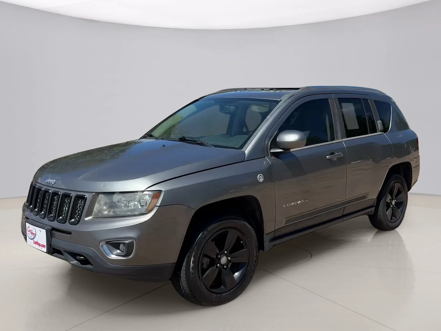 Used 2014 Gray Jeep LIMITED image 1