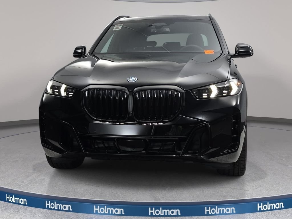 New 2026 Black Sapphire Metallic BMW xDrive50e image 2