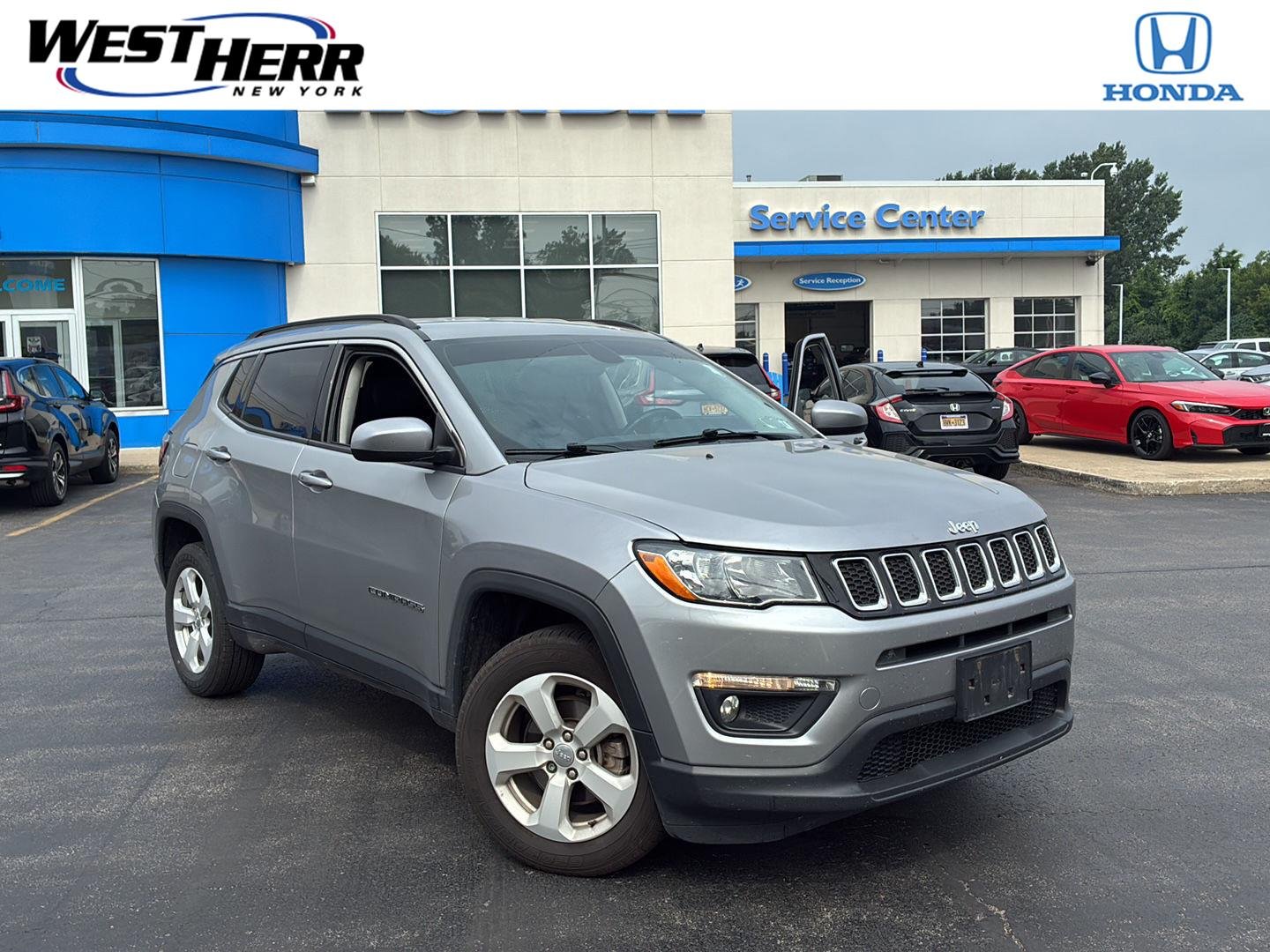 Used 2020 Billet Silver Metallic Clearcoat Jeep Latitude image 1
