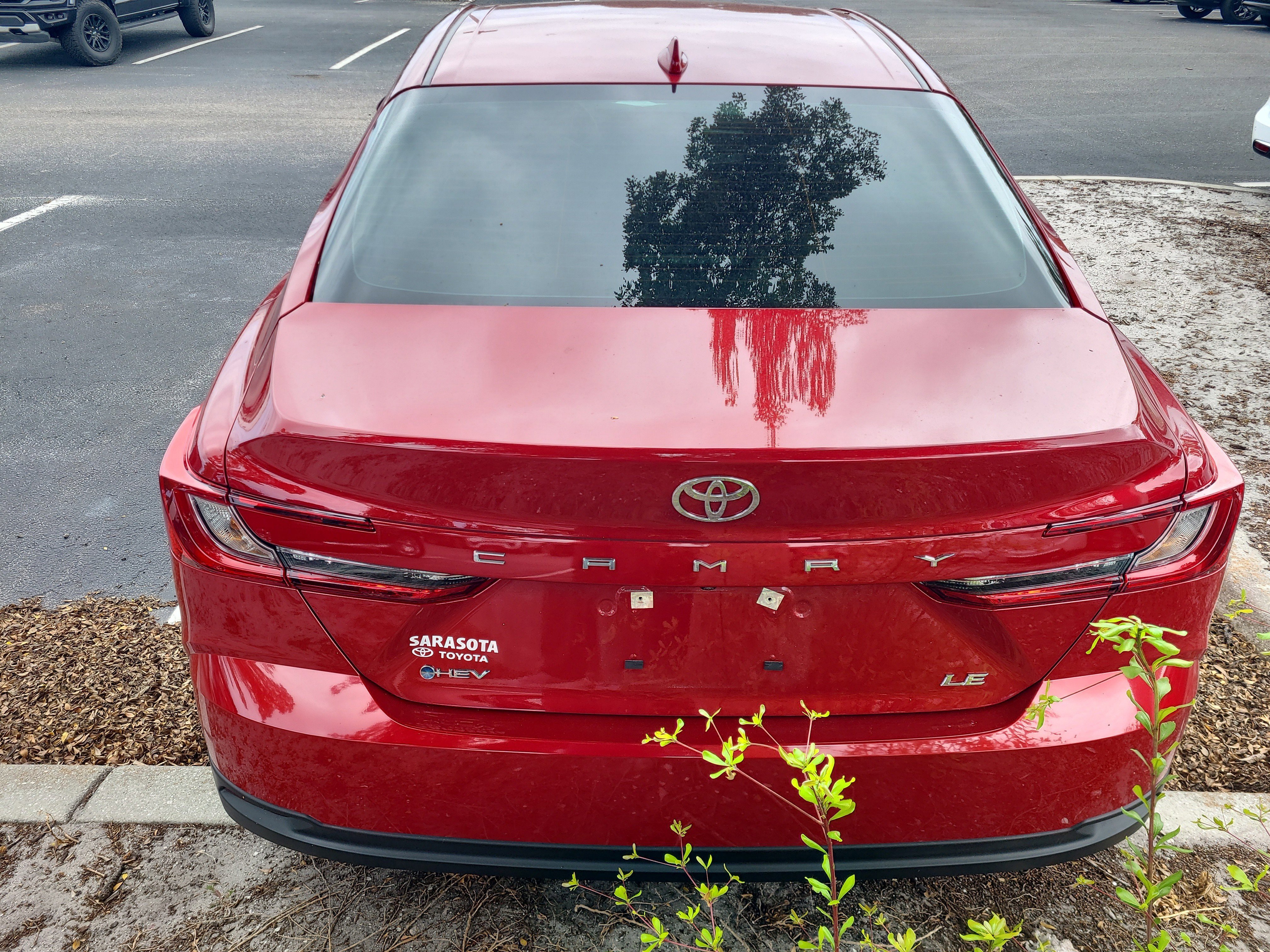 Used 2025 Red Toyota LE image 7