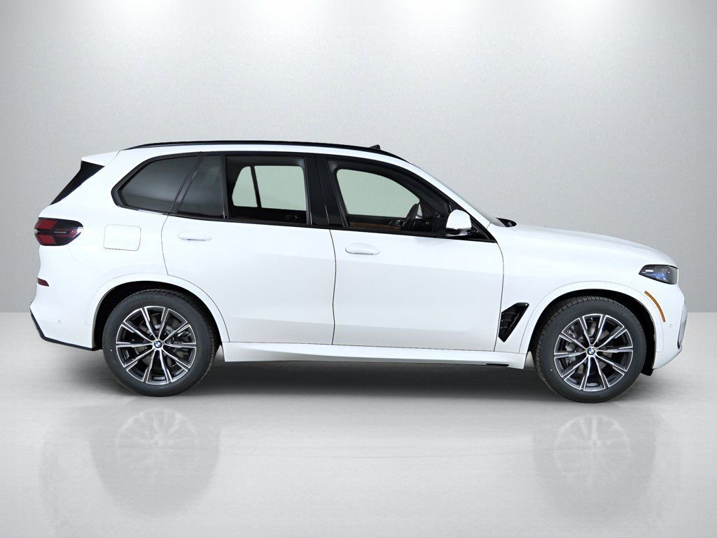 Used 2026 Mineral White Metallic BMW xDrive50e image 9