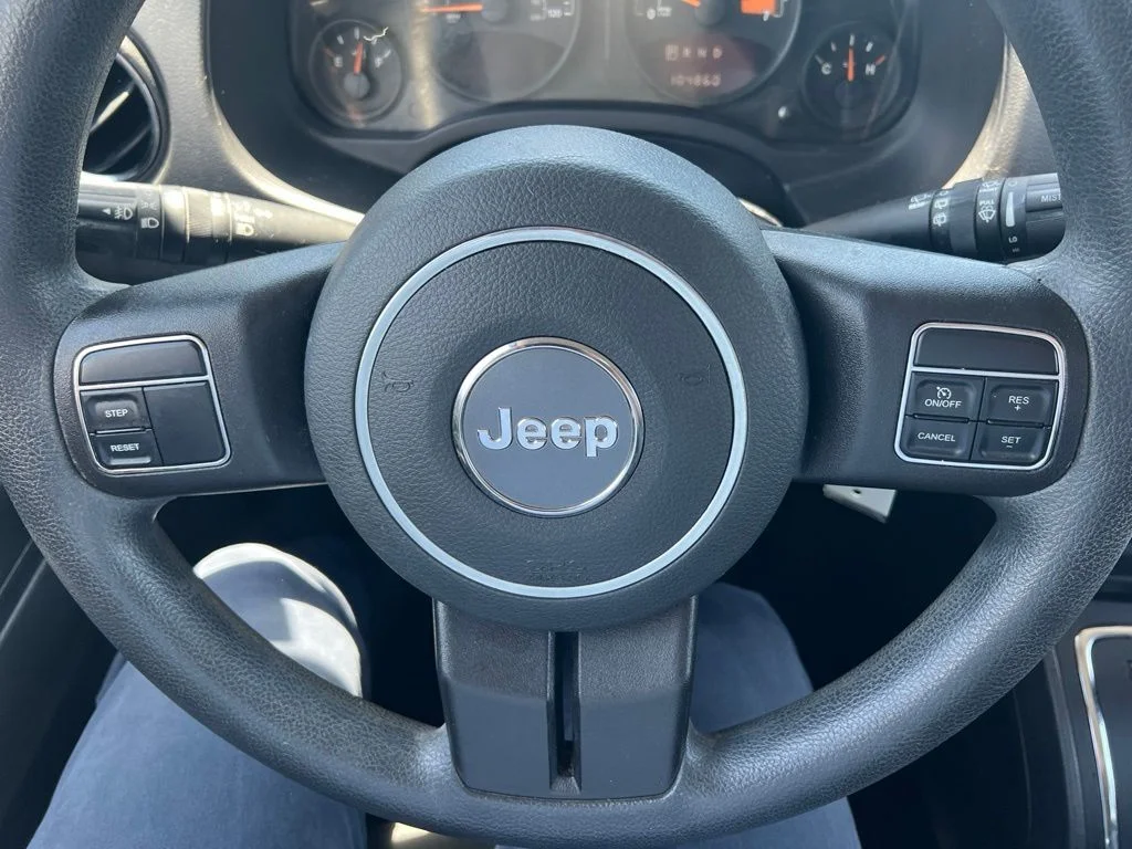 Used 2015 Billet Silver Metallic Clearcoat Jeep Sport image 11