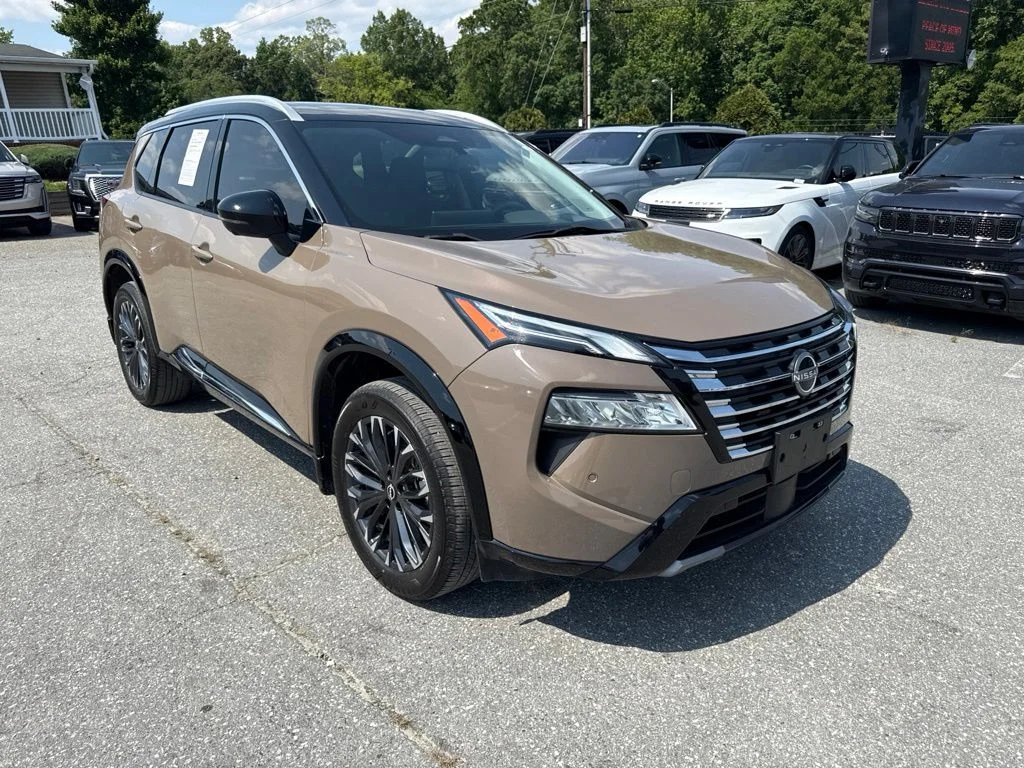 Used 2024 Black Nissan Platinum image 2