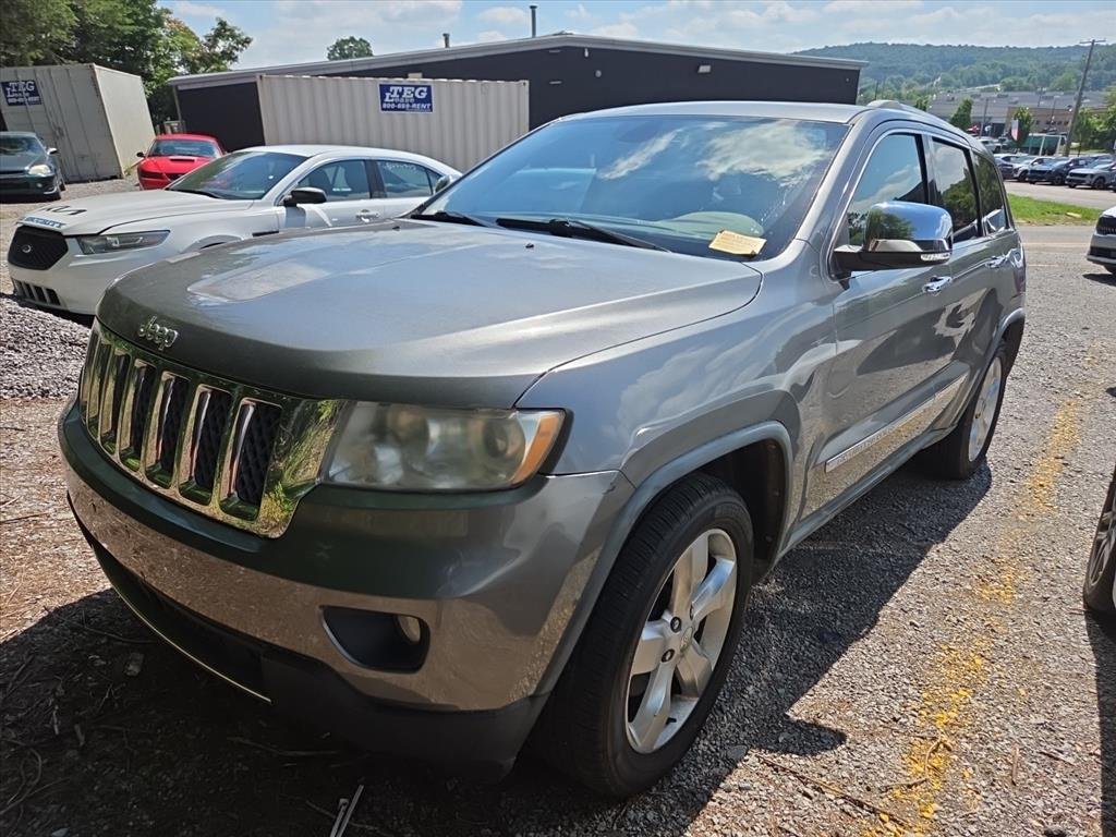 Used 2011 Gray Jeep Overland image 1