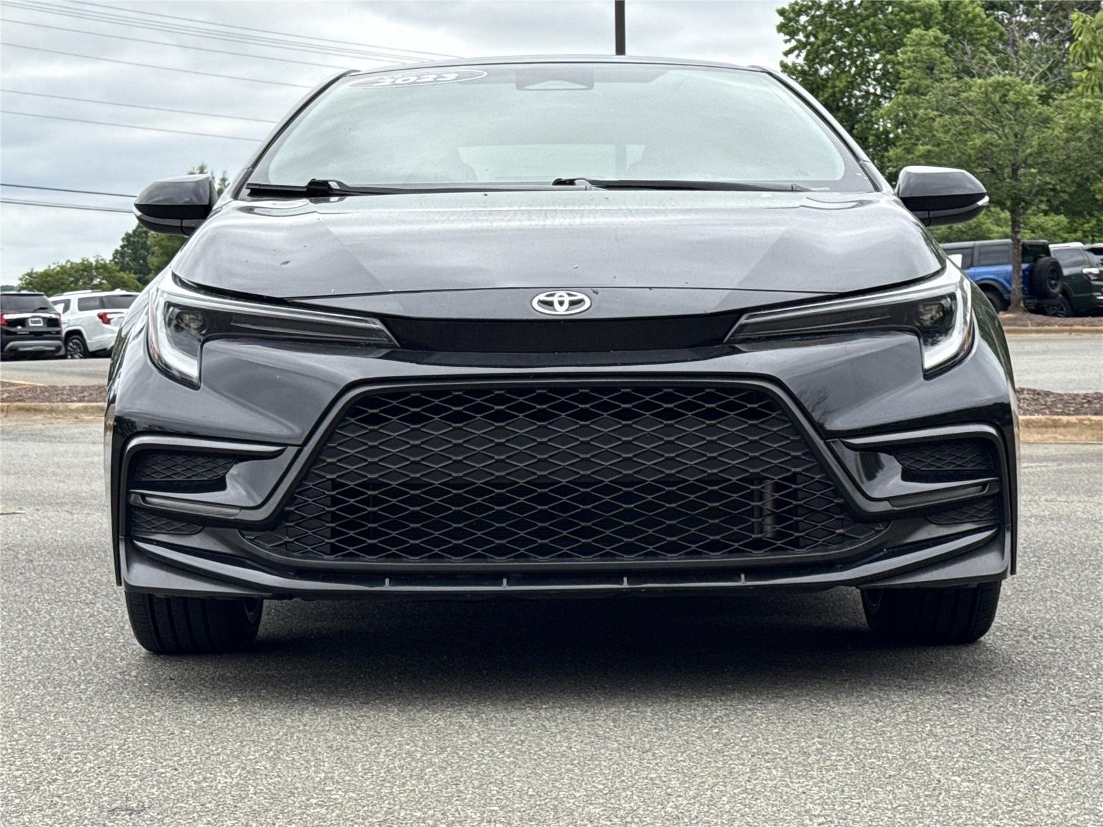 Used 2023 Midnight Black Metallic Toyota SE image 28