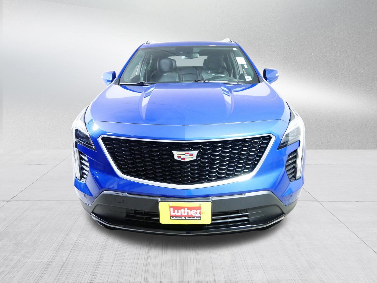 Used 2022 Cadillac XT4 Sport with VIN 1GYFZFR48NF108275 for sale in Brooklyn Center, Minnesota