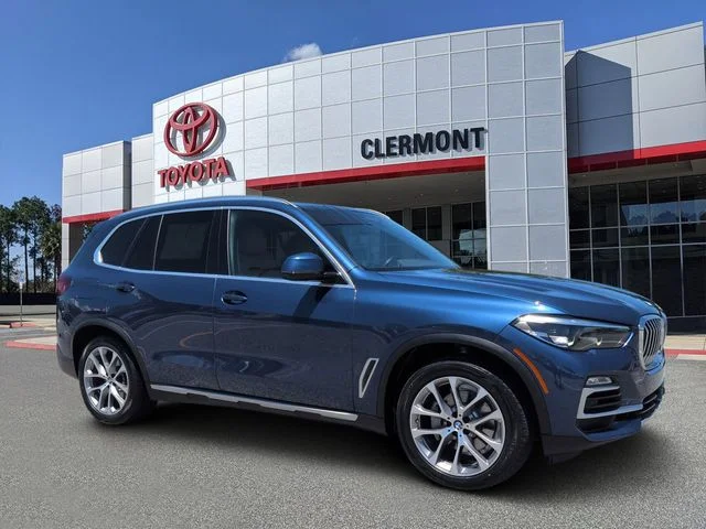 Used 2021 Blue BMW sDrive40i image 1