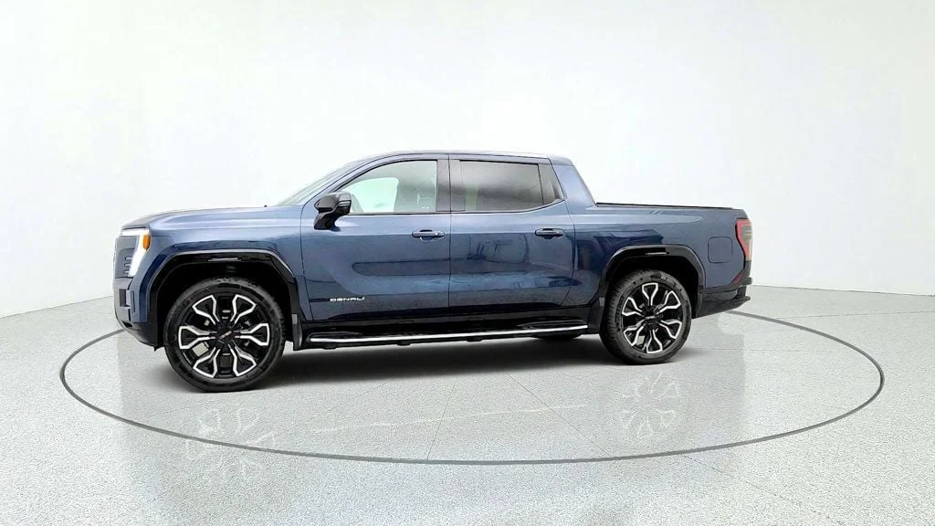 Used 2026 Deep Ocean Metallic GMC e4WD Crew Cab Max Range Denali image 8