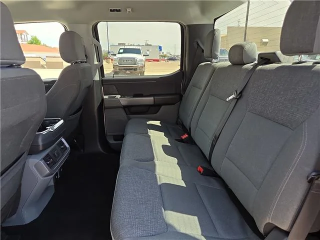 Used 2024 Iconic Silver Metallic Ford XLT 4x4 SuperCrew Cab 5.5 ft. box 145 in. WB image 12
