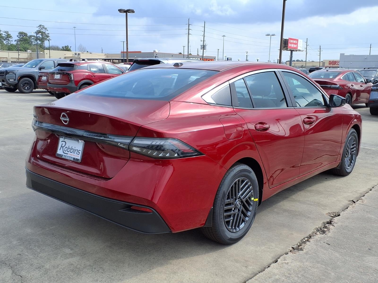 2026 Nissan Sentra SV Red at Robbins Nissan