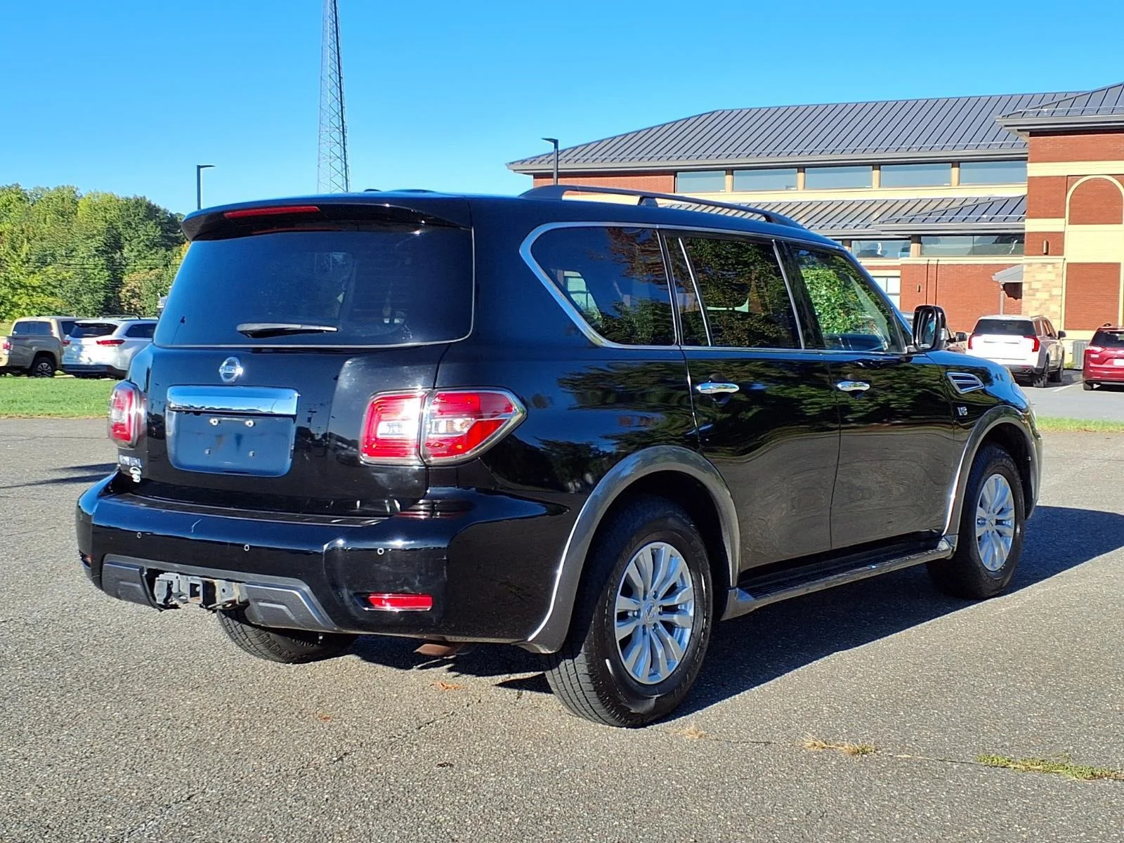 Used 2019 Super Black Nissan SV image 2