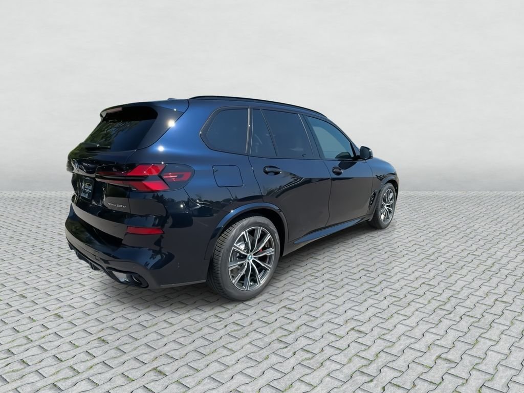 New 2026 Carbon Black Metallic BMW xDrive50e image 8