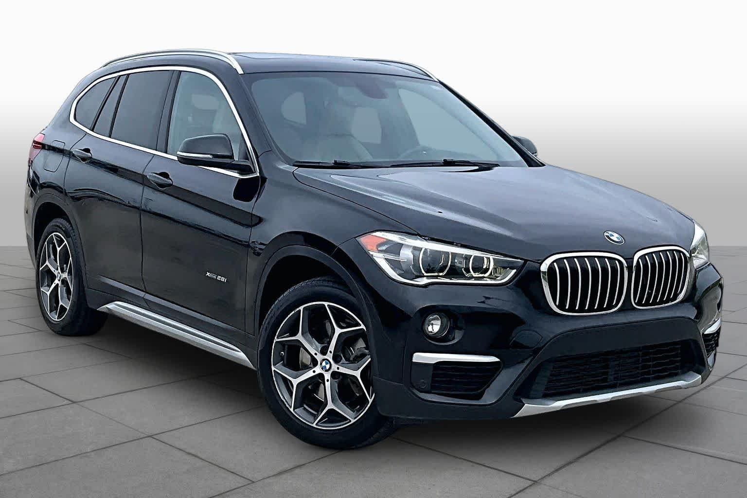 Used 2018 BMW X1 28i with VIN WBXHT3C39J5K30659 for sale in Webster, TX