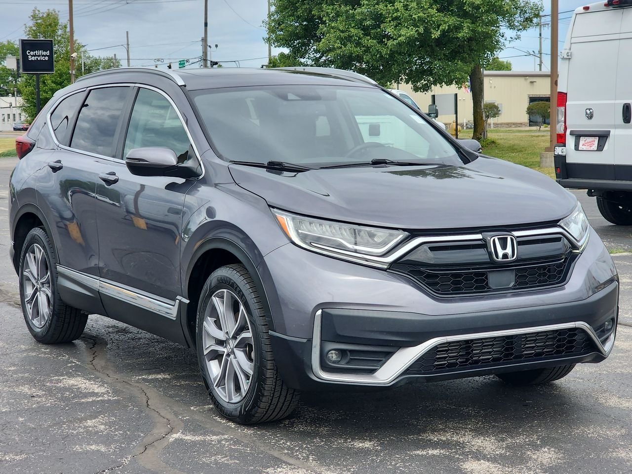 Used 2022 Sonic Gray Pearl Honda Touring image 1