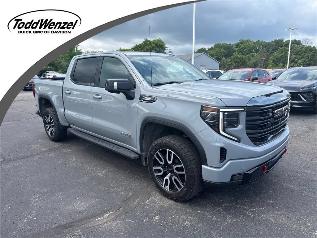 Used 2024 Thunderstorm Gray GMC AT4 image 1