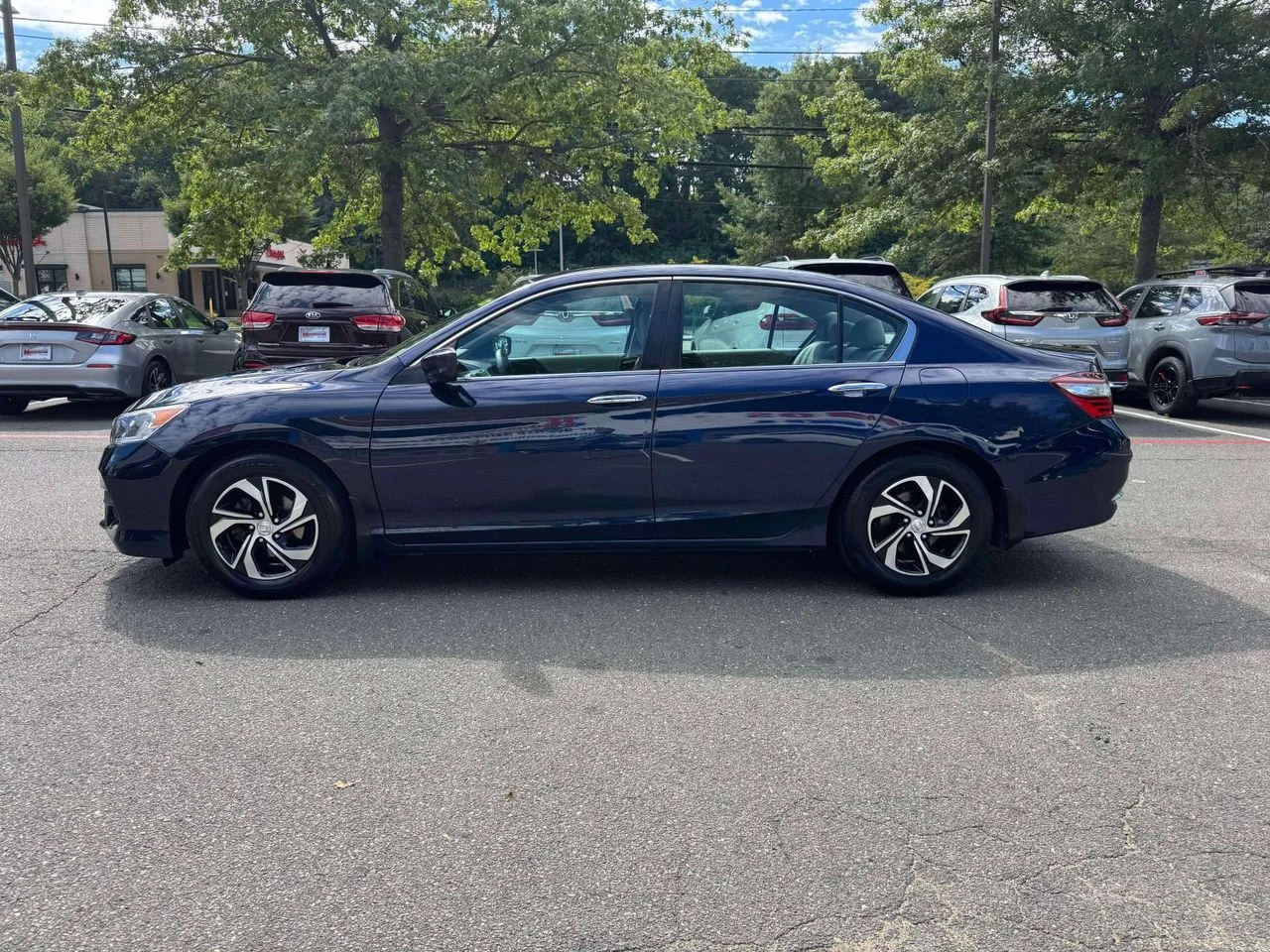 Used 2017 Deep Blue Opal Metallic Honda LX image 4