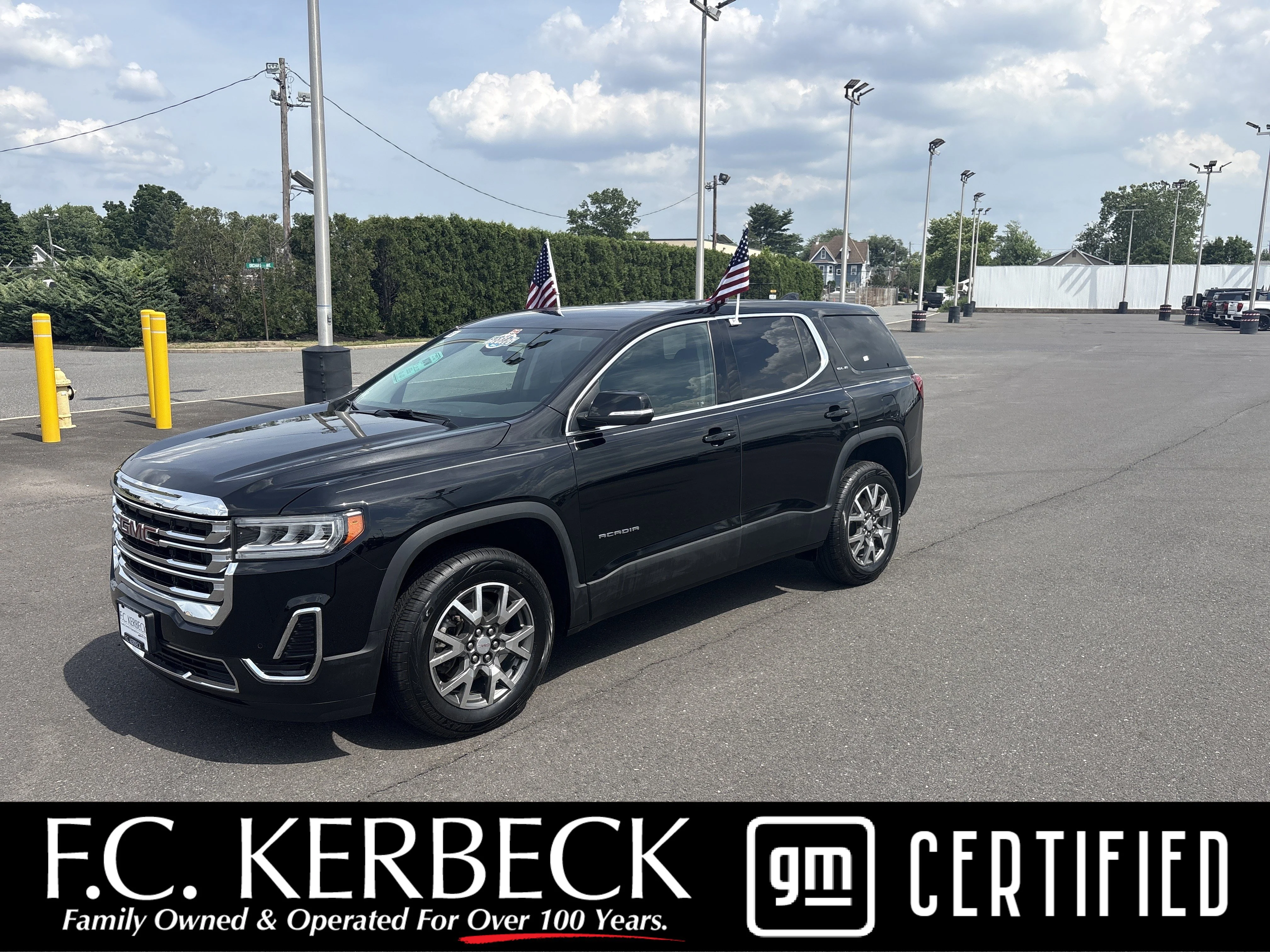 Used 2023 Ebony Twilight Metallic GMC SLE image 1