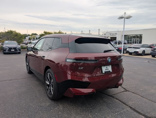 Certified Used 2024 Aventurin Red Metallic BMW xDrive50 image 2