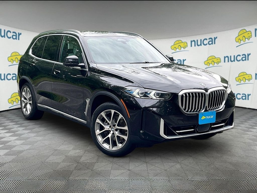 Used 2024 Black Sapphire Metallic BMW xDrive40i image 1