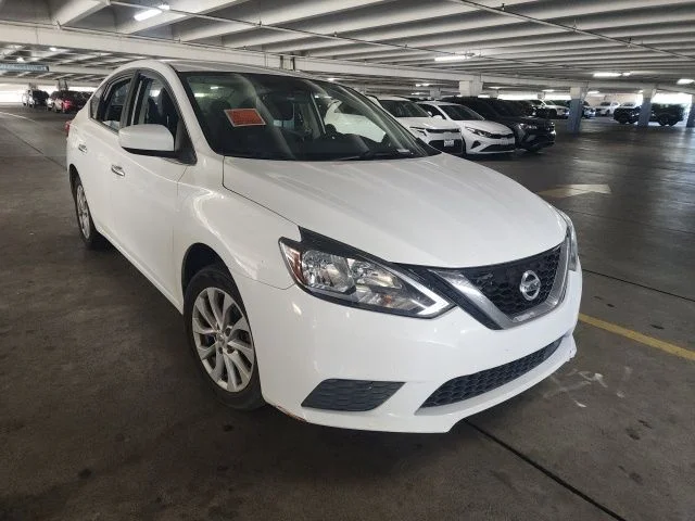 Used 2018 White Nissan SV image 1