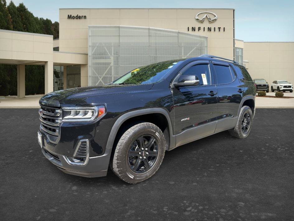 Used 2021 Ebony Twilight Metallic GMC AT4 image 1