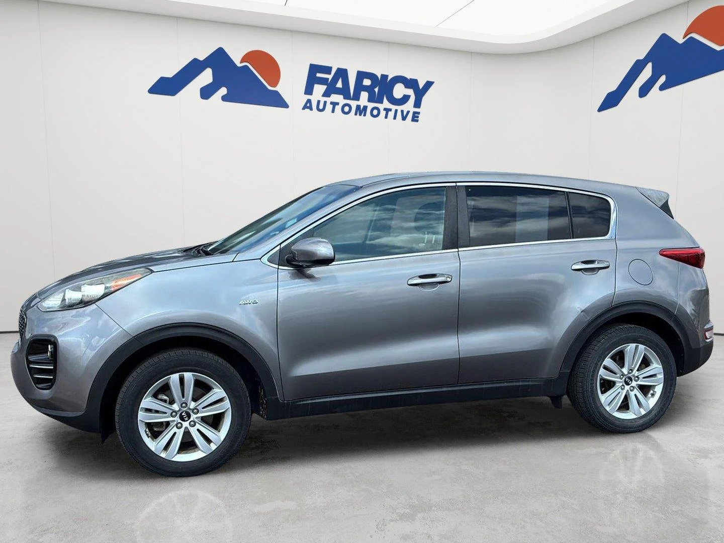 Used 2018 Mineral Silver Kia LX image 1