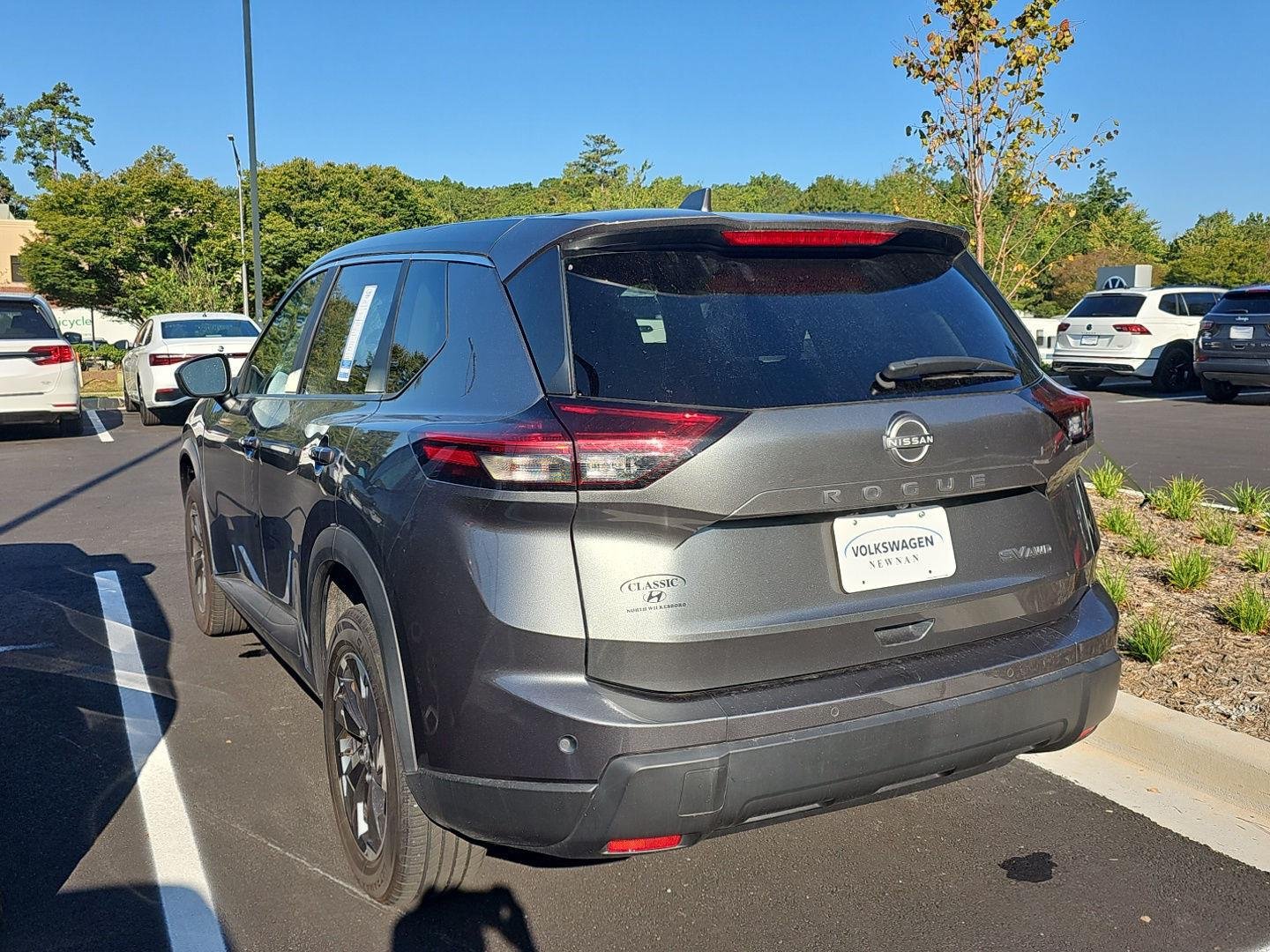 Used 2024 Gun Metallic Nissan SV image 5