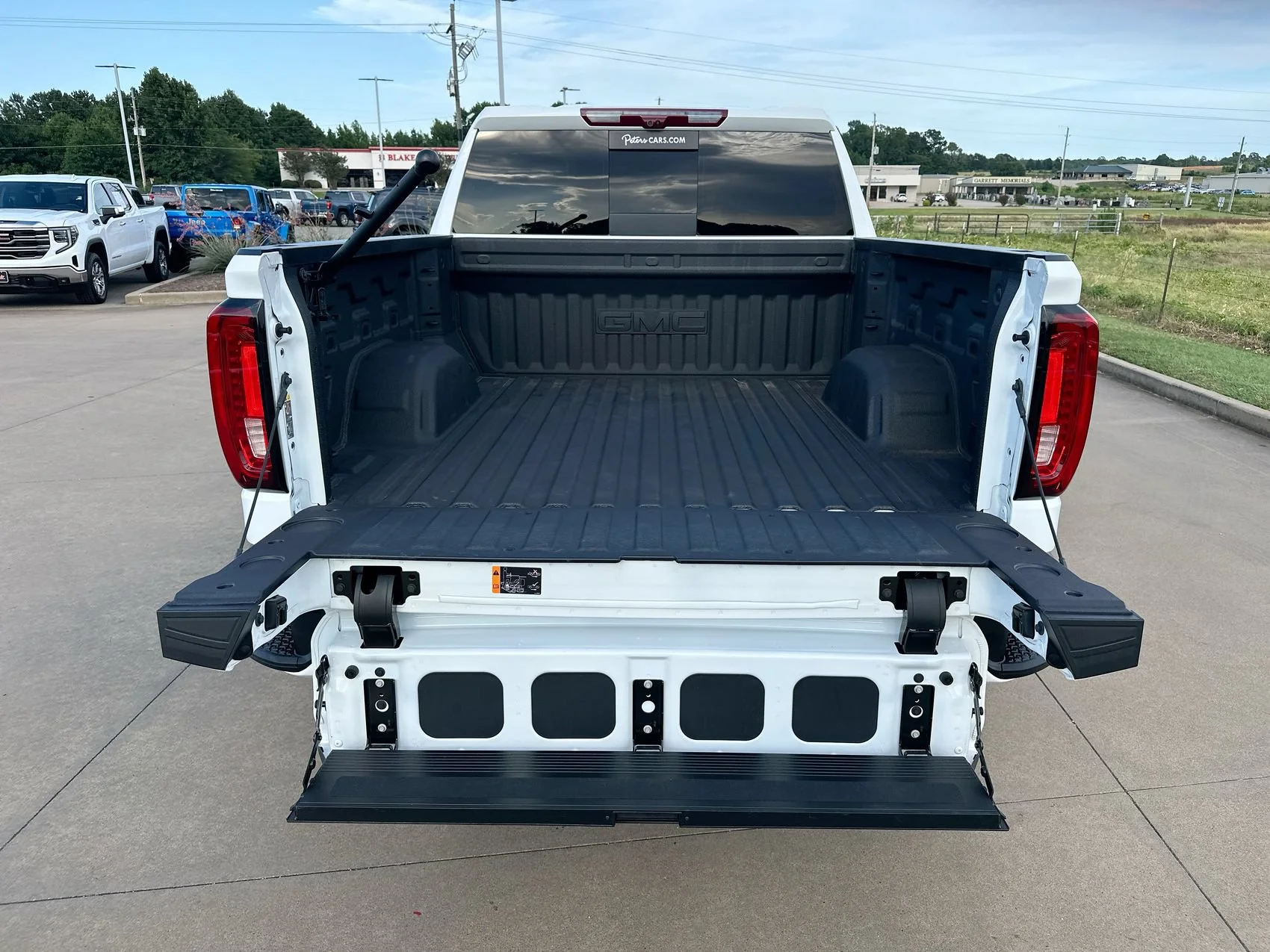 Used 2025 Summit White GMC AT4 image 25