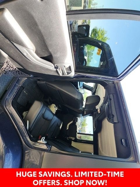 Used 2013 Blue Jeep Unlimited Sport image 23