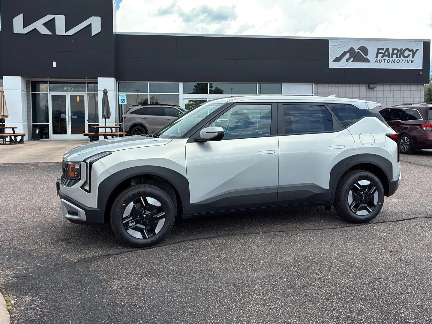 New 2027 Ivory Silver Kia LX image 1