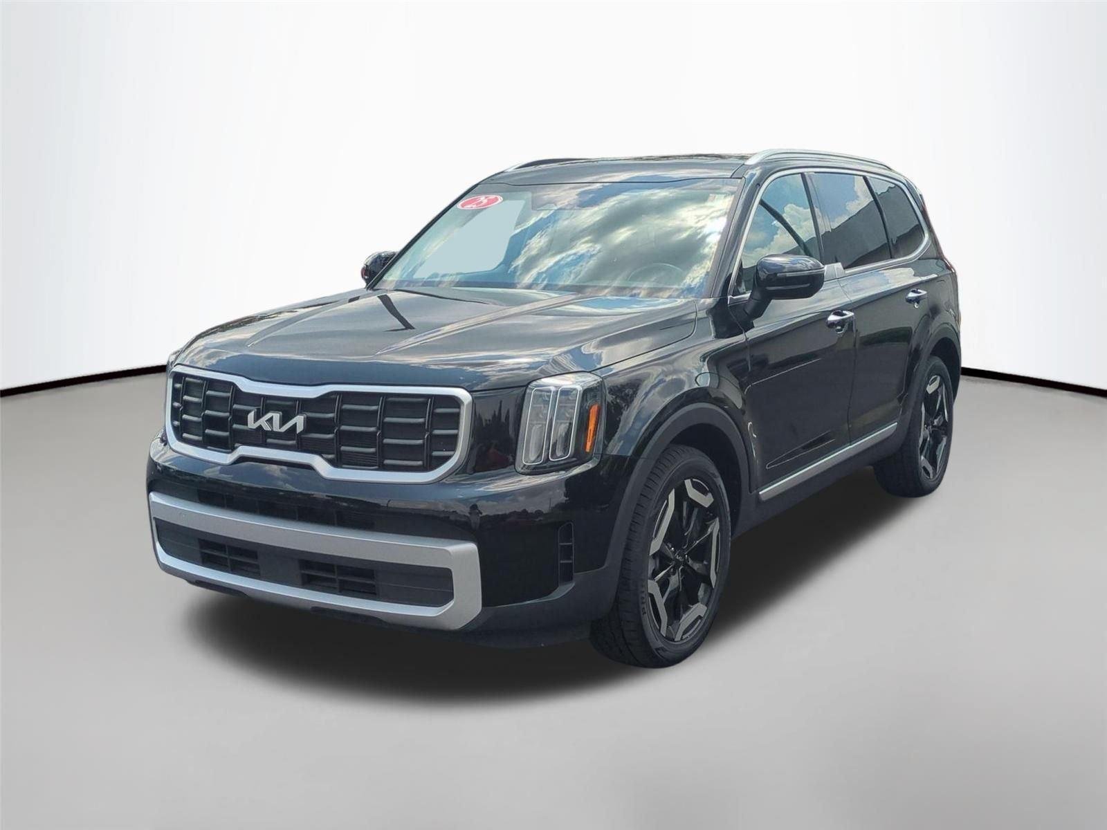 Used 2025 Ebony Black Kia S image 3