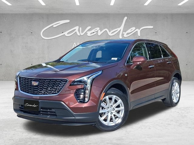 Used 2023 ROSEWOOD METALLIC Cadillac FWD Luxury image 1