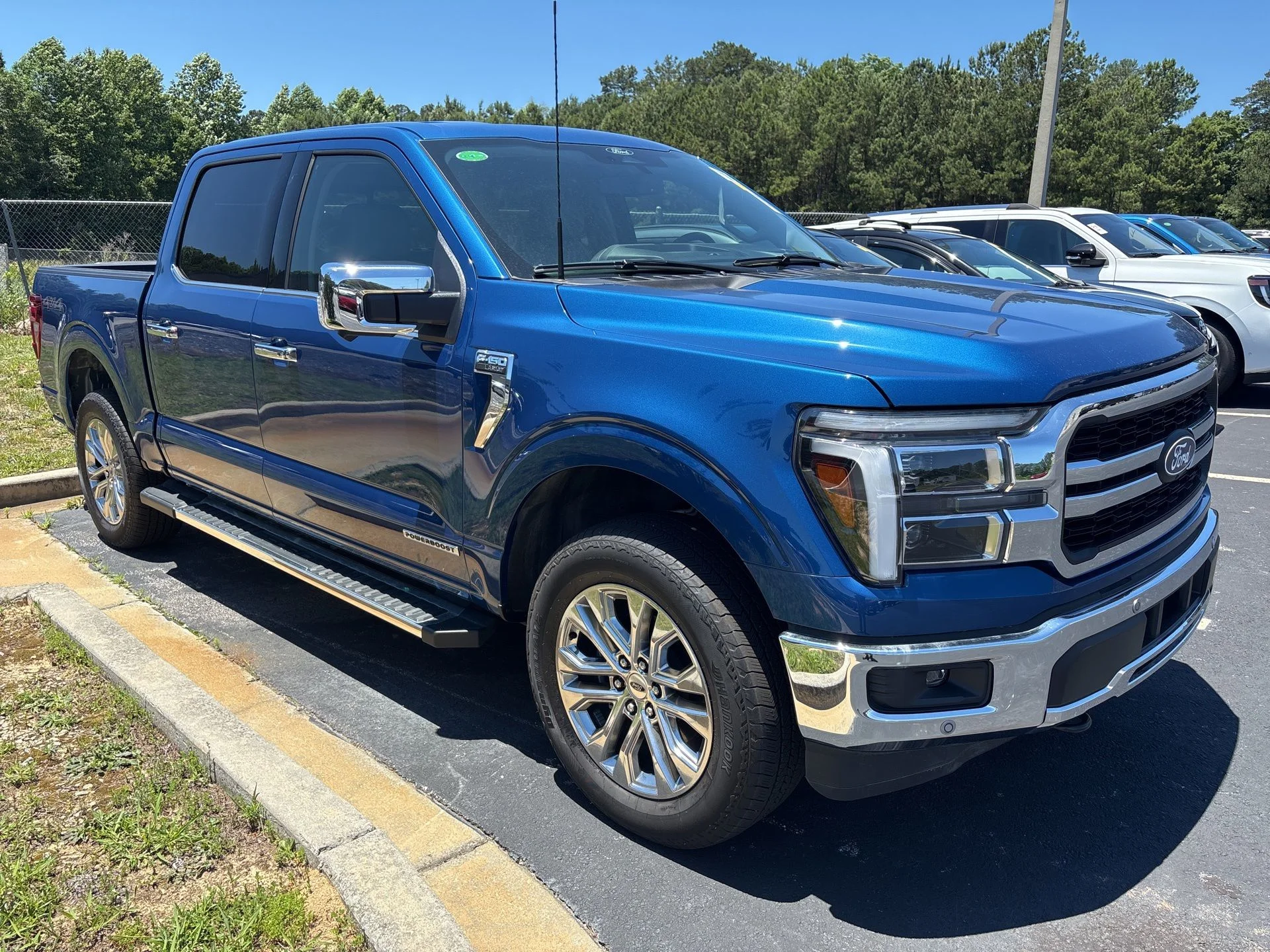Certified Used 2025 Blue Metallic Ford Lariat image 2