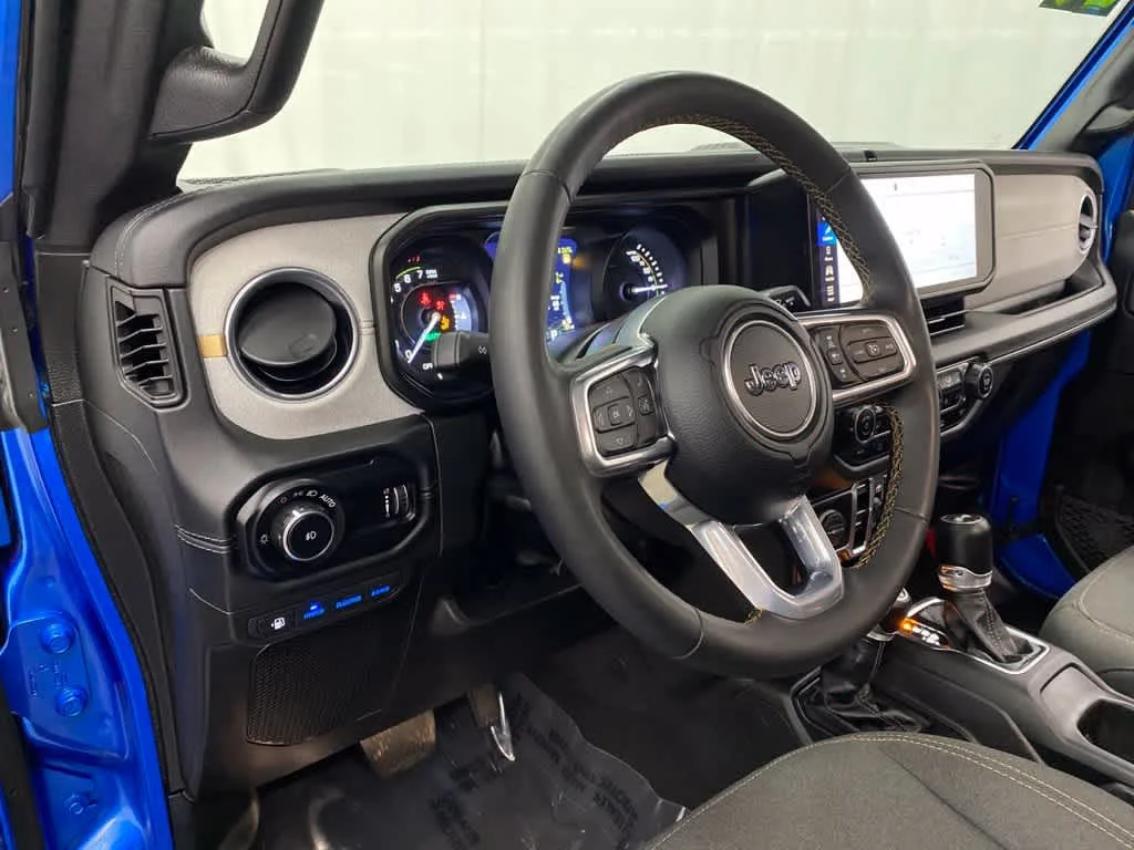 Used 2024 Hydro Blue Pearlcoat Jeep Sahara image 2