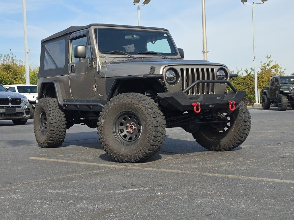 Used 2004 Light Khaki Metallic Jeep Unlimited image 9