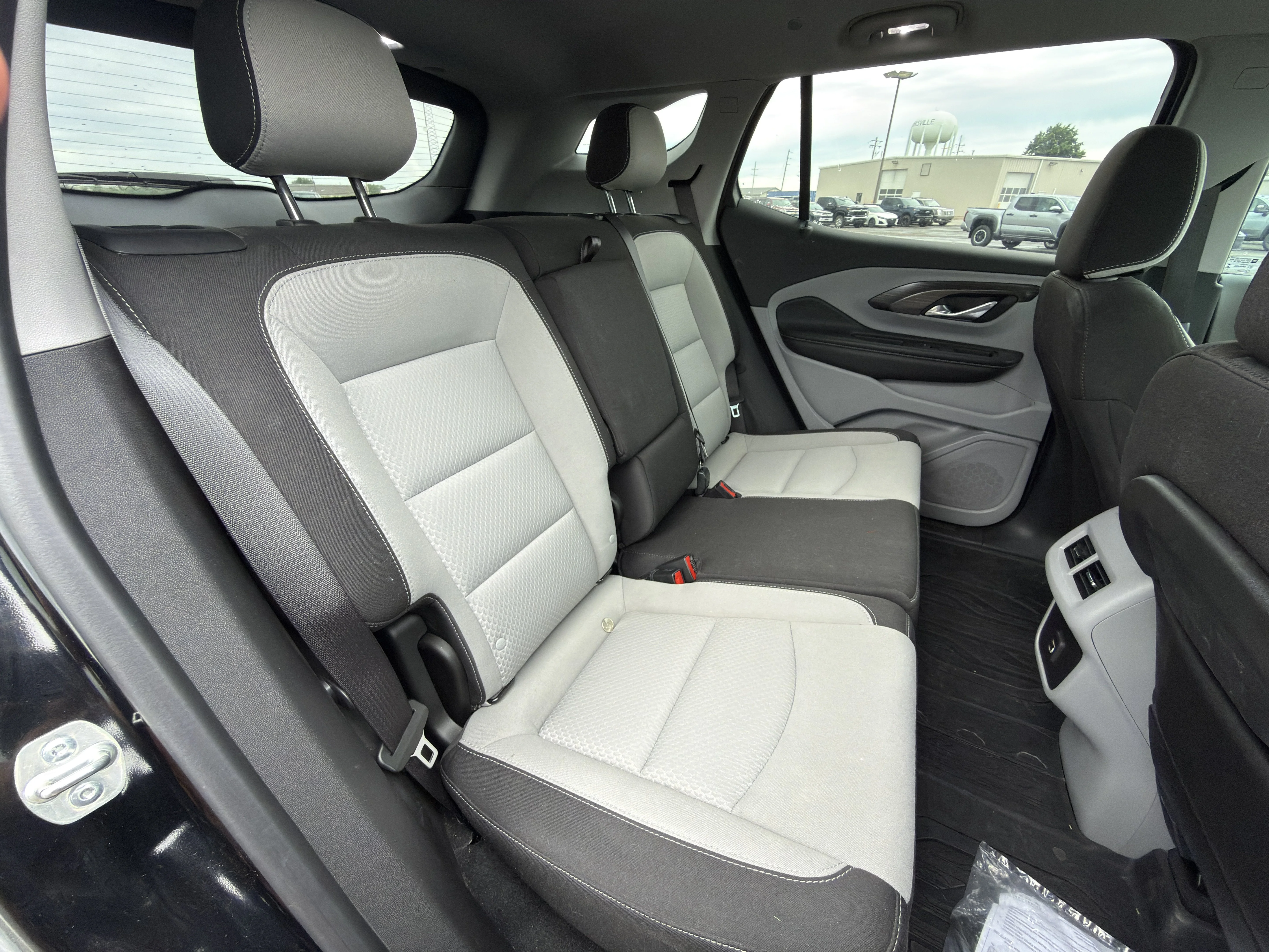 Used 2024 Ebony Twilight Metallic GMC SLE image 13