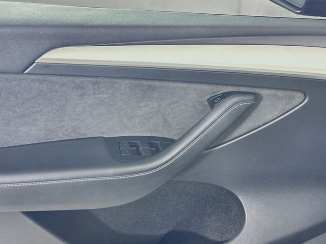 Used 2023 Solid Black Tesla Performance image 16
