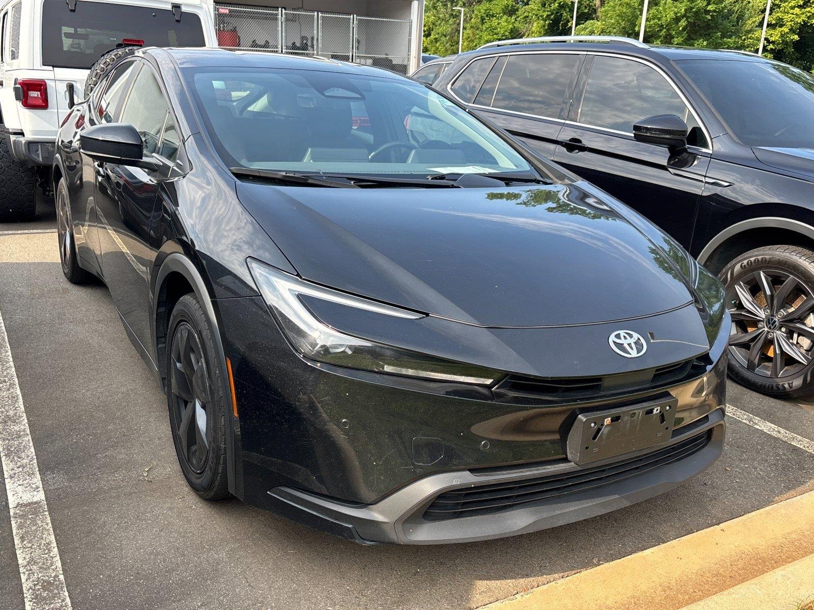 Used 2023 Midnight Black Metallic Toyota LE image 6