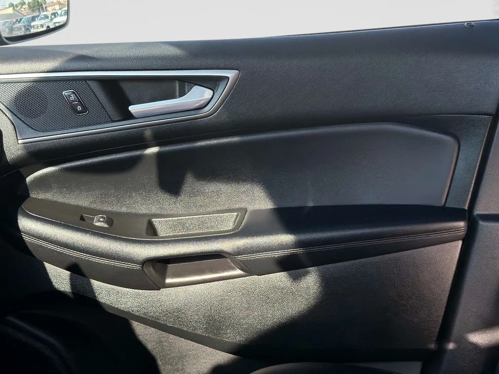 Used 2024 Agate Black Metallic Ford SEL image 23