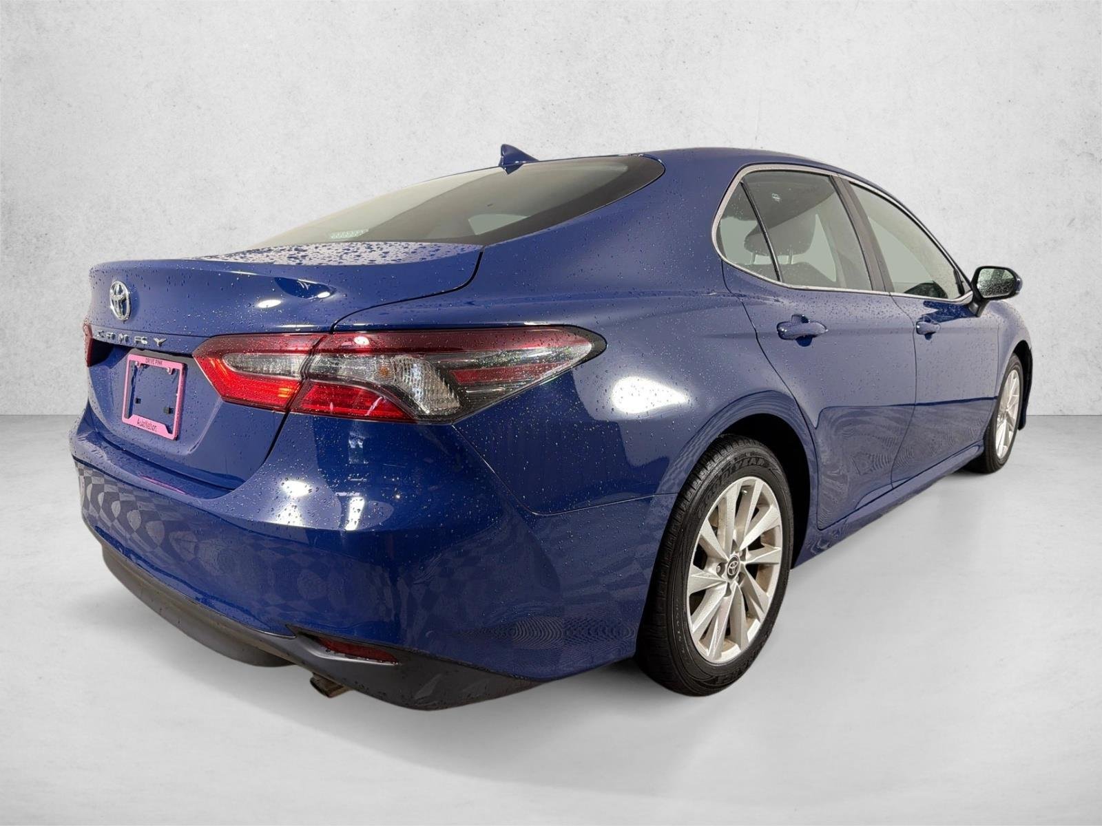 Used 2024 Reservoir Blue Toyota LE image 3