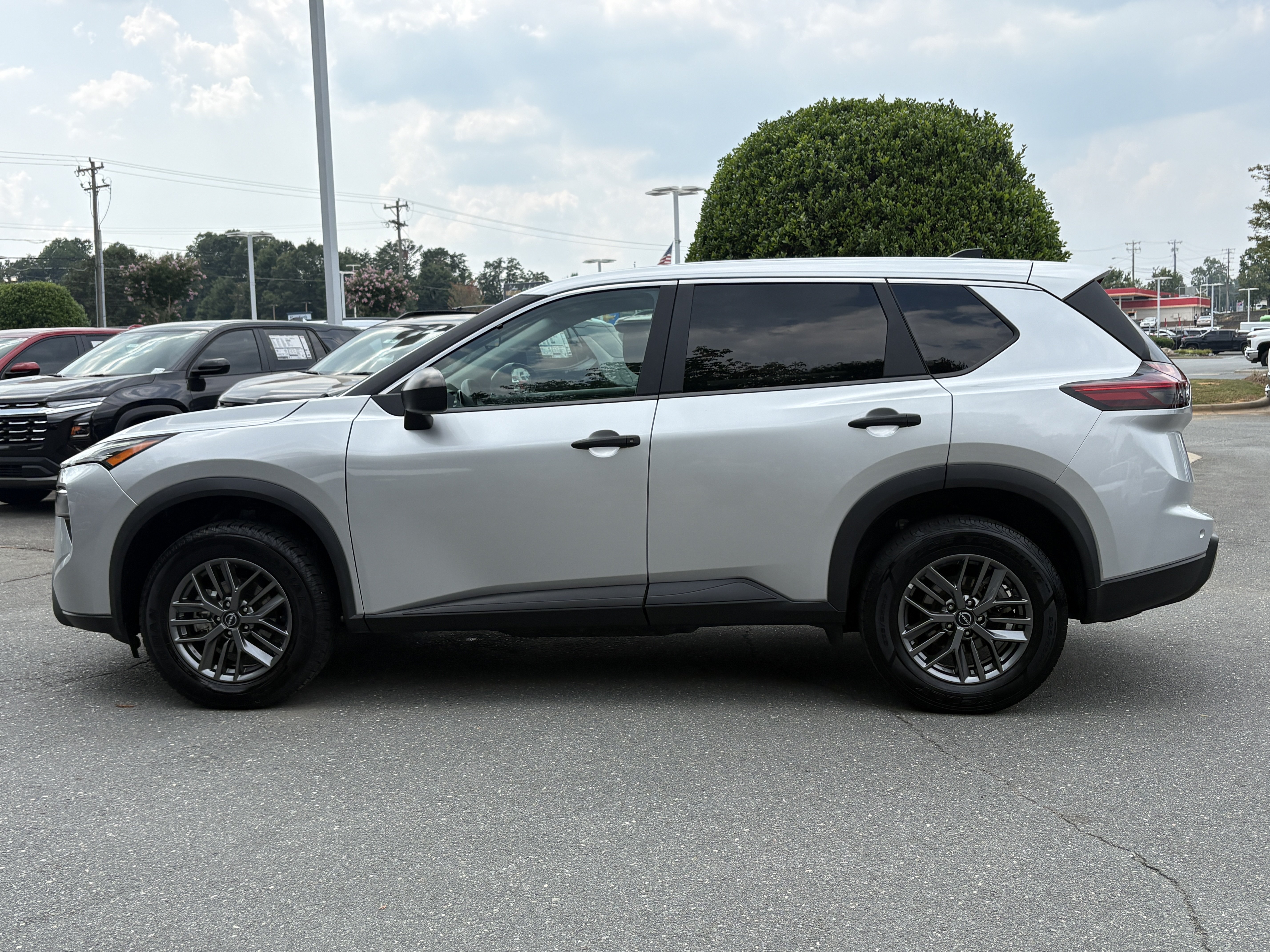 Used 2024 Brilliant Silver Metallic Nissan S image 2