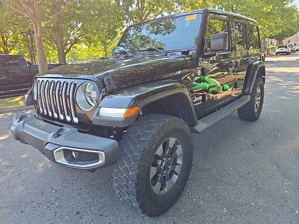 Used 2018 Black Jeep Unlimited Sahara image 4