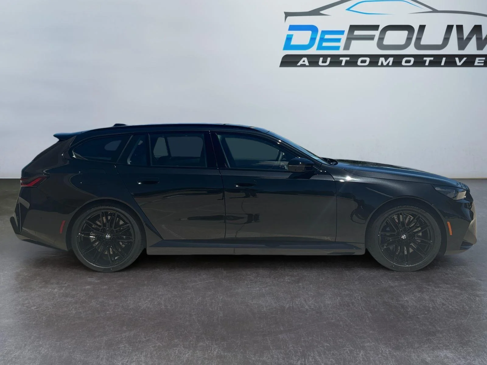 New 2027 Black Sapphire Metallic BMW TOURING image 2