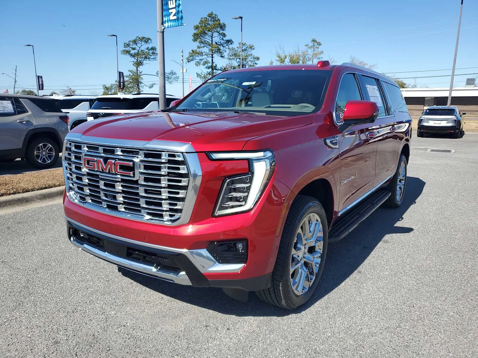 New 2026 Volcanic Red Tintcoat GMC Denali image 1