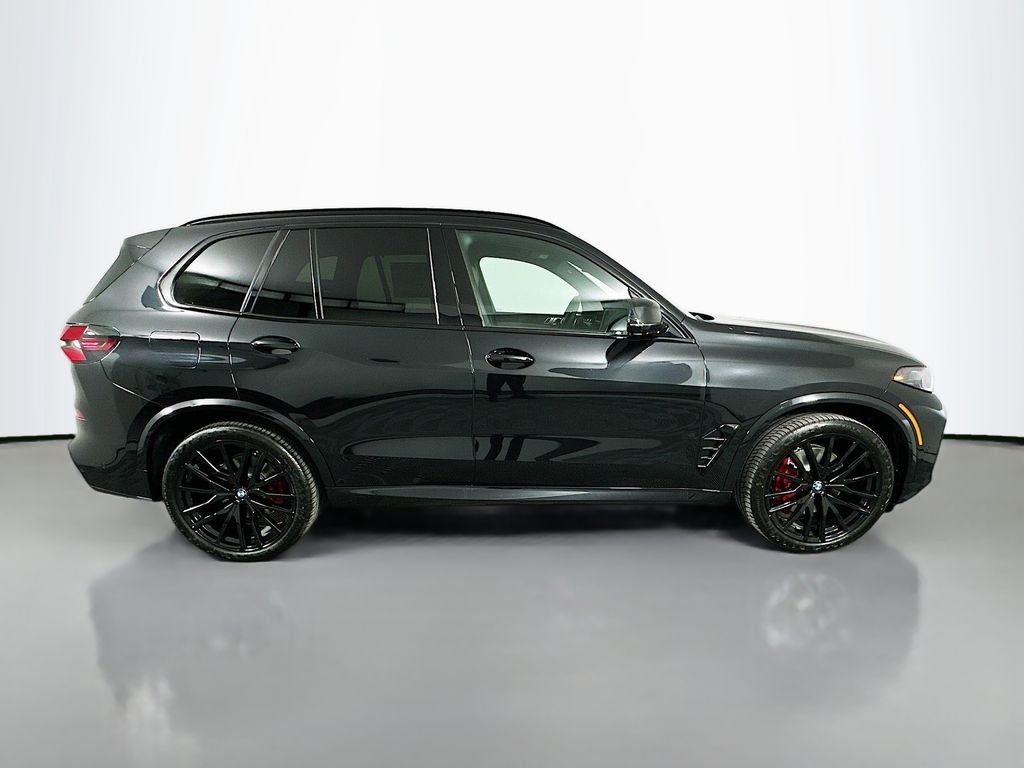 New 2026 Black Sapphire Metallic BMW xDrive40i image 4