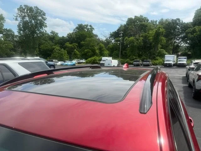Used 2023 Volcanic Red Tintcoat GMC AT4 image 4