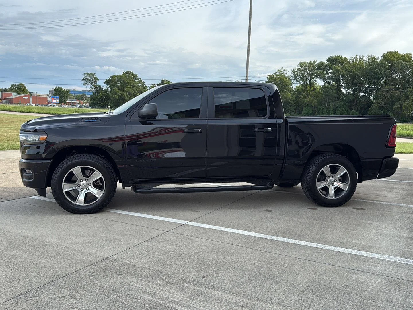 Used 2025 Diamond Black Crystal Pearlcoat Ram Tradesman image 4