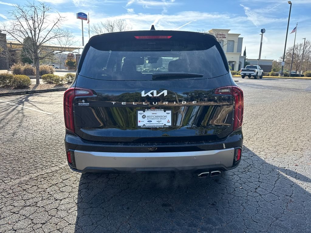 Used 2025 Black Kia S image 4
