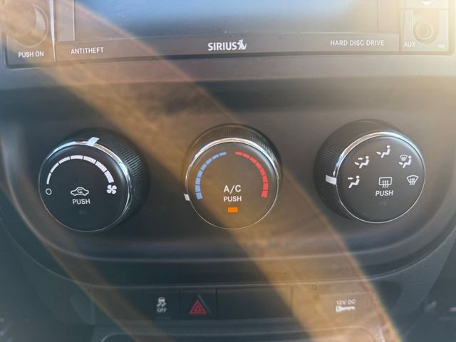 Used 2016 Granite Crystal Clearcoat Metallic Jeep Sport image 13